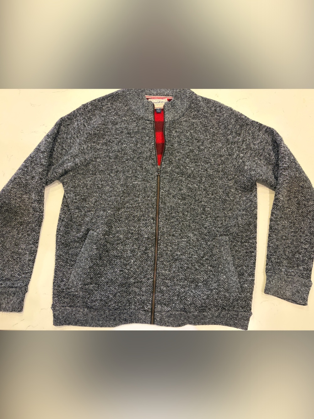 Men's Gray Zip-Up Knit Sweater with Buffalo Plaid Fleece Lining.